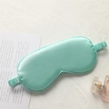 Mint green silk sleep eye mask with elastic headband and smooth satin finish texture - Elegant Green
