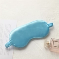 Light blue faux silk sleep mask with comfortable elastic strap on white linen background - Sky Blue