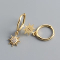 Detail of S925 sterling silver gold hoop earrings with sparkling sunburst charms - 925 Silver / Gold Color (Pair)
