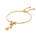 Bracciale farfalla in titanio dorato con diamanti e chiusura a scorrimento regolabile - Oro (KB123875-KFC)