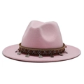 Detail of light pink wool fedora hat featuring ethnic ribbon and vintage coin charms - Pink
