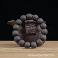 Unfinished 15mm ebony wood beads on a ceramic teapot showcasing natural grain texture - 12mm x 17Pcs Old Shape Beads
