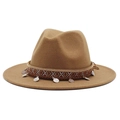 Detail of wool fedora with bohemian ethnic band and silver coin pendants on camel brown felt - Camel