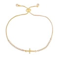 Gold-plated adjustable cross bracelet with sparkling cubic zirconia on a white background - Cross Style