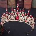 Detailed close-up of Baroque gold crown with red crystals and white rhinestones - Gold with Red Rhinestones