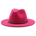 Detail of rose red wool fedora hat featuring a brown leather band and metal bead accents - Rose Red
