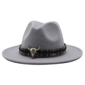 Detail of light gray wide brim fedora with ethnic woven band and silver bull head badge - Light Gray