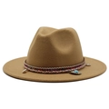 Detail of camel wool fedora hat featuring colorful woven band with shell and turquoise stone - Camel