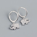 Detail view of silver S925 earrings with crystal-studded elephant charms and black accents - 925 Silver / White Gold