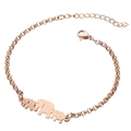 Close-up of rose gold elephant family charm bracelet with adjustable lobster clasp chain - Elephant / Rose Gold
