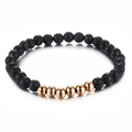 Pulsera elástica de piedra de lava negra con seis cuentas redondas de metal dorado - Oro rosa