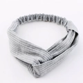 Grey knitted twisted headband for women with ribbed texture and elastic band backing - Light Gray