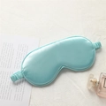 Elegant mint green faux silk sleep mask with elastic strap on aesthetic background - Fresh Green