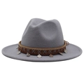 Detail of light grey wool fedora hat featuring ethnic woven band and silver metal charms - Light Gray