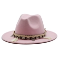 Detail of pink wool fedora hat featuring ethnic woven band with shells and tassels - Pink