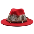 Close-up of red wool felt fedora featuring natural feathers and ethnic coin ornaments - M (55-58cm) / Red