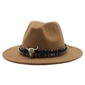 Close-up of brown wool fedora hat featuring ethnic woven band and silver bull skull charm - Light Coffee