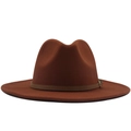 Detail of rust red fedora hat with narrow brown leather band and golden buckle - Caramel color