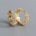 Macro shot of gold S925 sterling silver star hoop earrings with sparkling zircon crystals - 925 Silver / Gold Color (Pair)