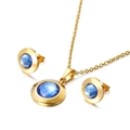 Conjunto de joyas doradas con collar de cristal azul redondo y pendientes a juego - Azul