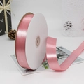 Roll of pink polyester satin ribbon for gift wrapping and floral packaging - 91m / 75# Korean Pink