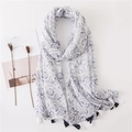 Linen cotton scarf with blue paisley print and tassels in a minimalist lifestyle setting - SL2004-052 (White Dark Blue Scroll Tassel)