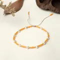 Handmade Miyuki bead bracelet with orange seeds, white pearls and gold accents - Orange Style (BR0313)
