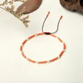 Handmade Miyuki bead bracelet with orange glass, pearls, and adjustable cord - Warm Orange Style (BR0319)
