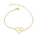 Detail of gold heart pendant with ECG pulse wave pattern on minimalist chain bracelet - Heart Beat / Gold