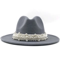 Close-up of elegant grey wool felt fedora hat featuring luxury white pearl embellishments - Gray