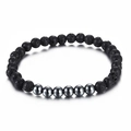 Pulsera elástica minimalista de piedra de lava negra y cuentas de acero pulido unisex - Negro