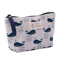 Canvas makeup bag with blue whale pattern and durable zip handle for travel storage - Whale
