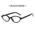 Lunettes de soleil ovales vintage avec monture noire et détails de points argentés - Cadre Noir
