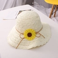 Creamy white crochet sun hat with sunflower accents and wavy brim for women - Adult M / Milk White