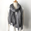 Grey crinkled cotton linen scarf with white stripes and fringe detail on mannequin - Side Stripe Grey