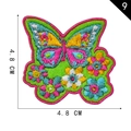 Green butterfly embroidery patch with pink and yellow floral details 4.8cm size - Style 9