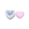 Translucent heart-shaped silicone resin mold with a pink finished heart model - Large Mirror 3D Heart Mold
