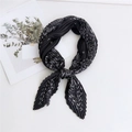 Pleated black silk scarf featuring a white star and celestial pattern print - Celestial Black Background