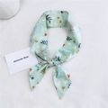 Light green cotton linen scarf with koala and plant print tied in a stylish bow knot - Koala Green