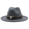 Detail of dark grey wool fedora hat featuring ethnic woven band and silver bull skull accent - Dark Gray