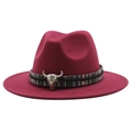 Detail of deep red wool fedora featuring ethnic woven band and silver bull skull ornament - Burgundy