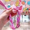 Detail of pink glitter butterfly hair tie with long colorful gradient braided extensions - Pink Bowknot