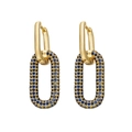 Dettaglio di orecchini dorati con cristalli blu incastonati a pavé in design ovale - Placcato Oro Zirconia Blu