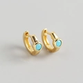 Elegante gouden oorringen met turquoise blauwe zirkoon voor een vintage modestijl - Goud