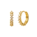 Macro view of gold huggie earrings with round-cut clear cubic zirconia insets - Gold / Clear Zirconia