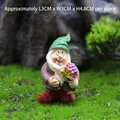 Miniature garden gnome holding flowers, 3x3x4.8cm resin figure for moss landscapes - Gnome with Flowers