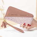Long zip-around wallet for women in dusty pink faux leather with sequin stitching and tassel - Deep Pink