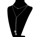 Double-layered silver tree of life pendant necklace displayed on a black bust stand - Tree of Life Style (KN107913-Z)