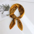 Yellow pleated silk scarf featuring black bohemian astrological patterns and stars - Celestial Yellow Background