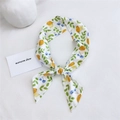 Long linen cotton silk scarf with yellow lemon and blue berry floral pattern tied in a bow - Green Leaf Lemon